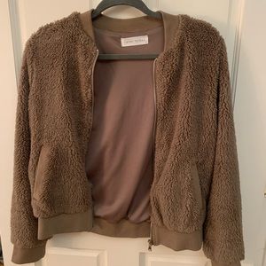 Brown fuzzy jacket.